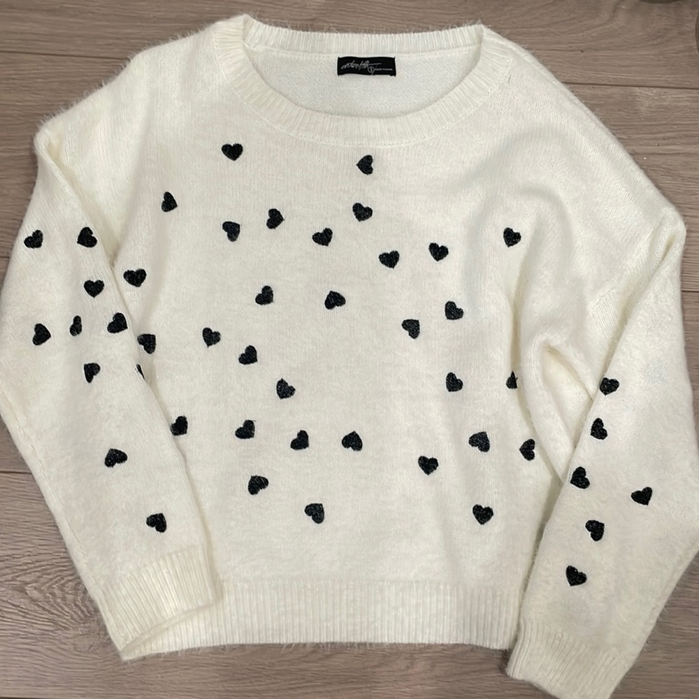 NWT. Heart Sweater. White with black . Size small .